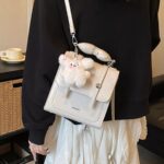 45eae90e-2efb-4284-849f-ba66ad4336b9-Max-Origin.jpg Flap Mini Backpack Bag